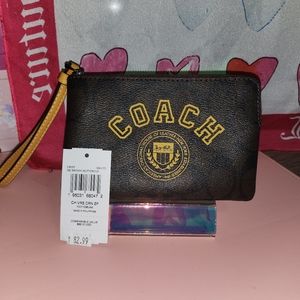 Coach brown and yellow small wristlet